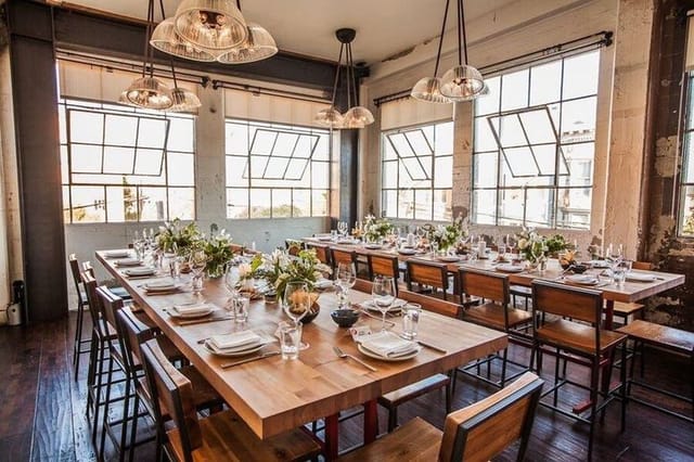 Private dining room with elegant table settings for intimate gatherings and corporate events.