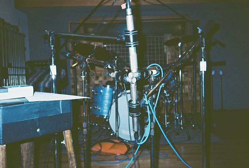 Recording studio with microphones, ideal for music events and workshops.