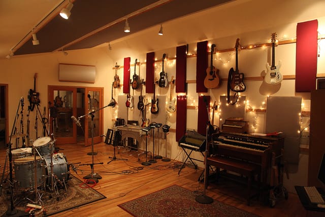 Decibelle Recording studio with warm lighting, ideal for music workshops and events.
