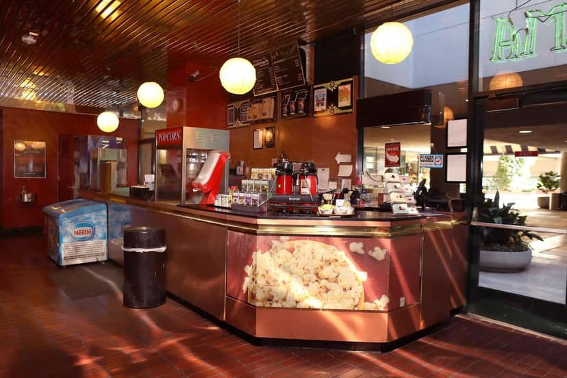 Larger Auditoriums concession stand at Landmark Opera Plaza Cinema for events and networking.