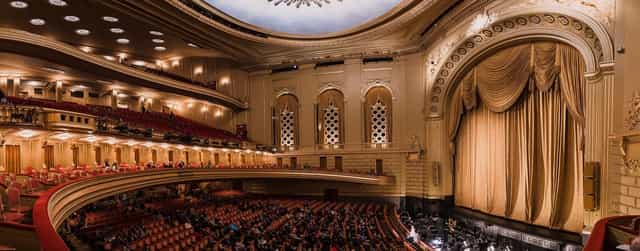 Larger Auditoriums at Landmark Opera Plaza Cinema with elegant architecture for events.