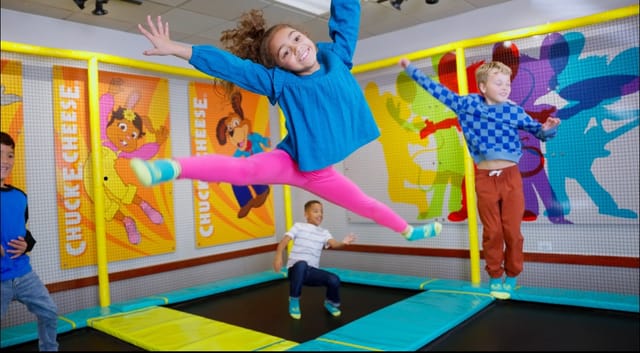 Kids jumping on trampolines at Chuck E. Cheese Burbank for birthday parties and events.