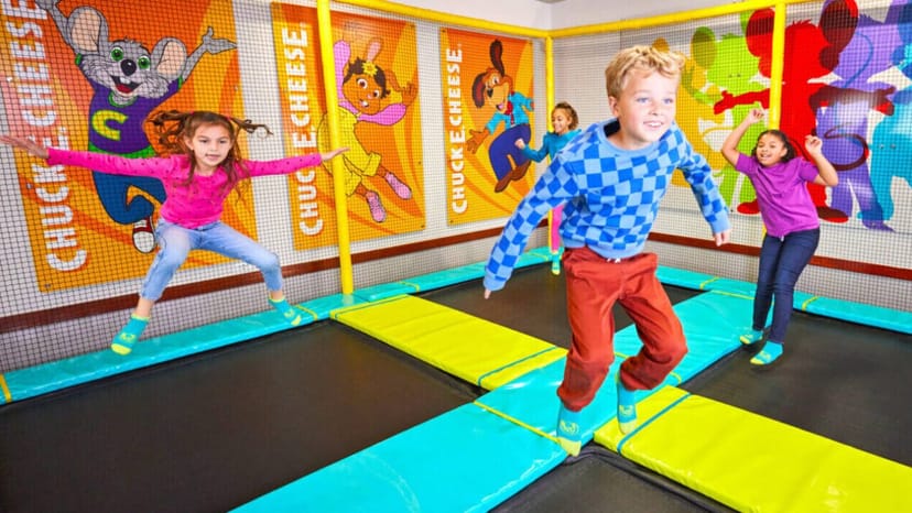 Trampoline Zone at Chuck E. Cheese Burbank, colorful trampolines for kids' birthday parties.