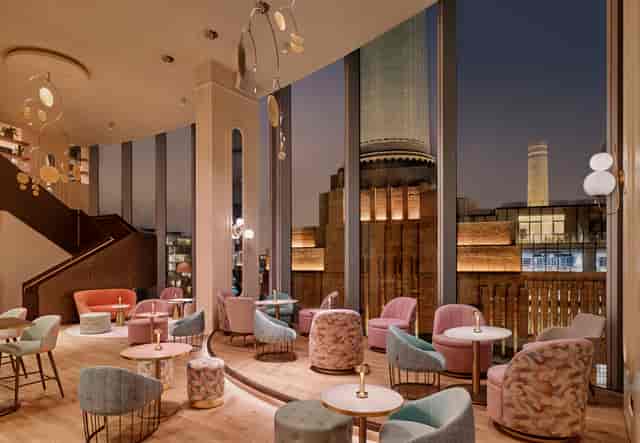 Stylish JOIA BAR event space in art'otel London with city views, perfect for gatherings.