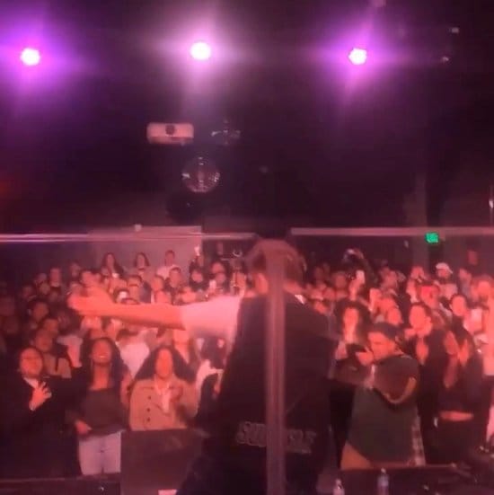 Vibrant live event at The Echo with engaged audience and captivating performer.