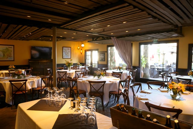 Elegant patio dining space at Tin Roof Bistro for events and gatherings.
