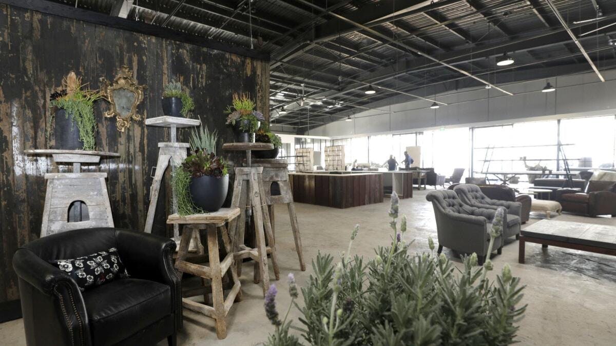 Modern event space with rustic decor, perfect for networking and gatherings.