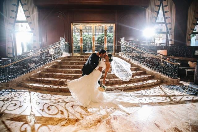Elegant wedding venue with grand staircases, perfect for romantic celebrations.