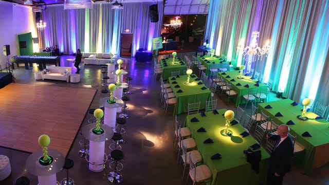 Billiard Room at The Carrus House, elegant event space with vibrant lighting and dance floor.