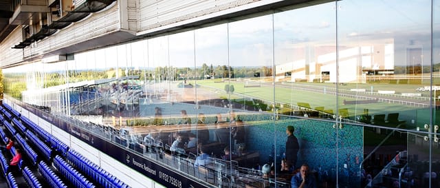 Modern event space at Kempton Park Racecourse with panoramic views for corporate meetings.