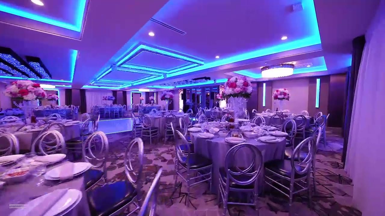 Modera Ballroom with blue lighting, ideal for upscale weddings and corporate events.