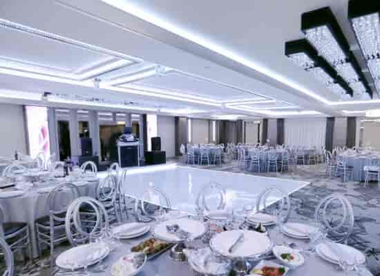 Elegant Modera Ballroom with fine dining setup, ideal for formal events and celebrations.