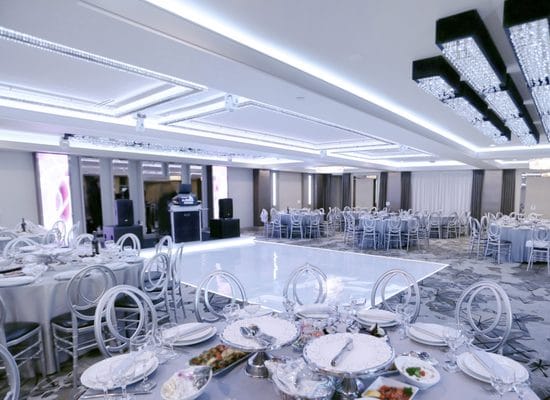Elegant Modera Ballroom with fine dining setup, ideal for formal events and celebrations.