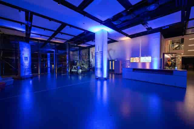 Christmas party venue with sleek architecture and ambient blue lighting at National Army Museum.