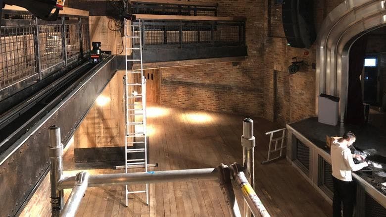 Lafayette London event space with rustic brick walls, perfect for intimate gatherings.
