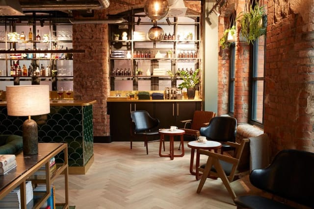 Stylish lounge in LEVEN Hotel Manchester for informal meetings and networking events.