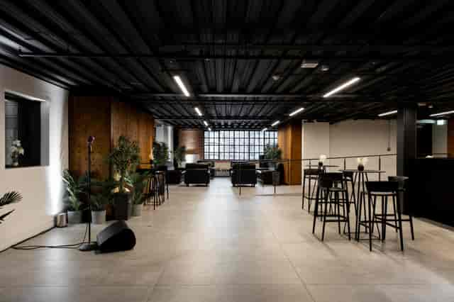Control Room A at Battersea Power Station, modern industrial event space with microphone.