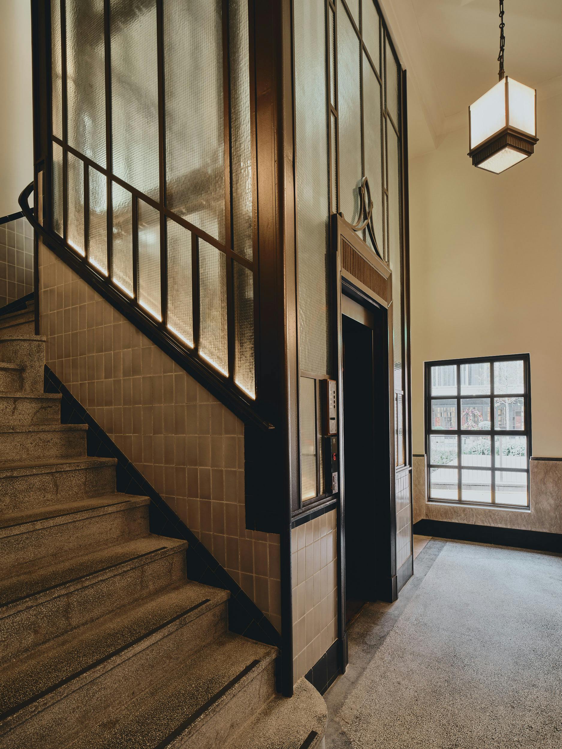 Control Room A at Battersea Power Station with staircase, ideal for events and meetings.