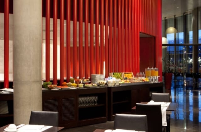 Spiral Restaurant at Porta Fira Hotel: modern buffet setup for corporate events.