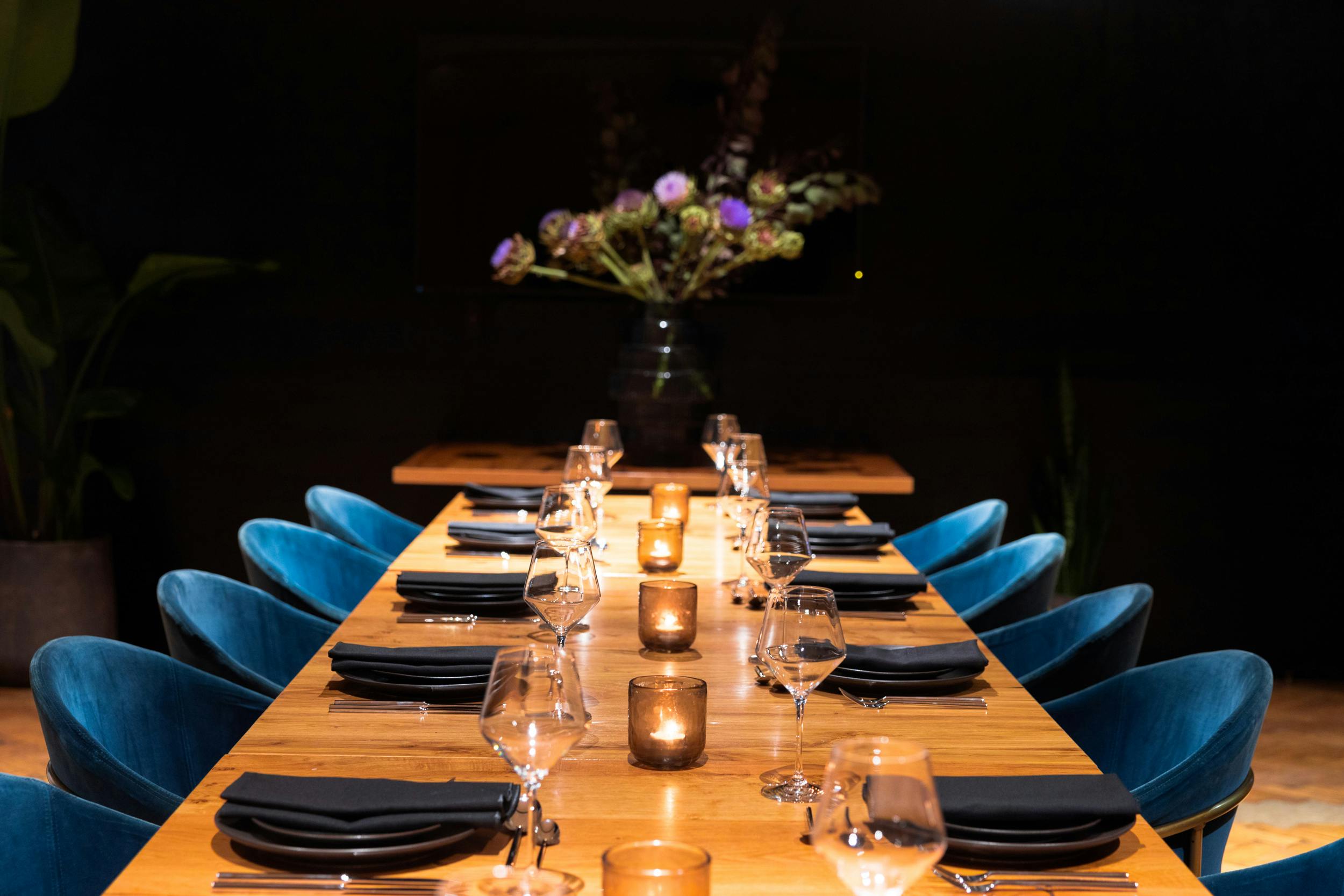 Elegant dining table setup in The Meeting Room Suite for upscale events and networking.