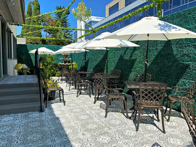Charming outdoor event space in Hollywood for casual meetings and networking.