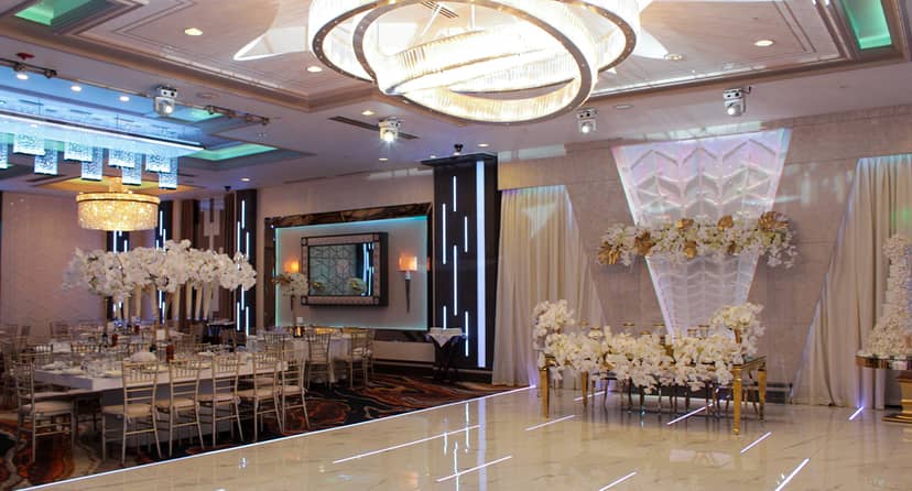 Grand Ballroom at Bellaj Banquet Hall with elegant chandeliers, perfect for weddings and events.