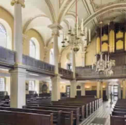 St Giles in the Fields Church venue with elegant chandeliers, ideal for weddings and conferences.