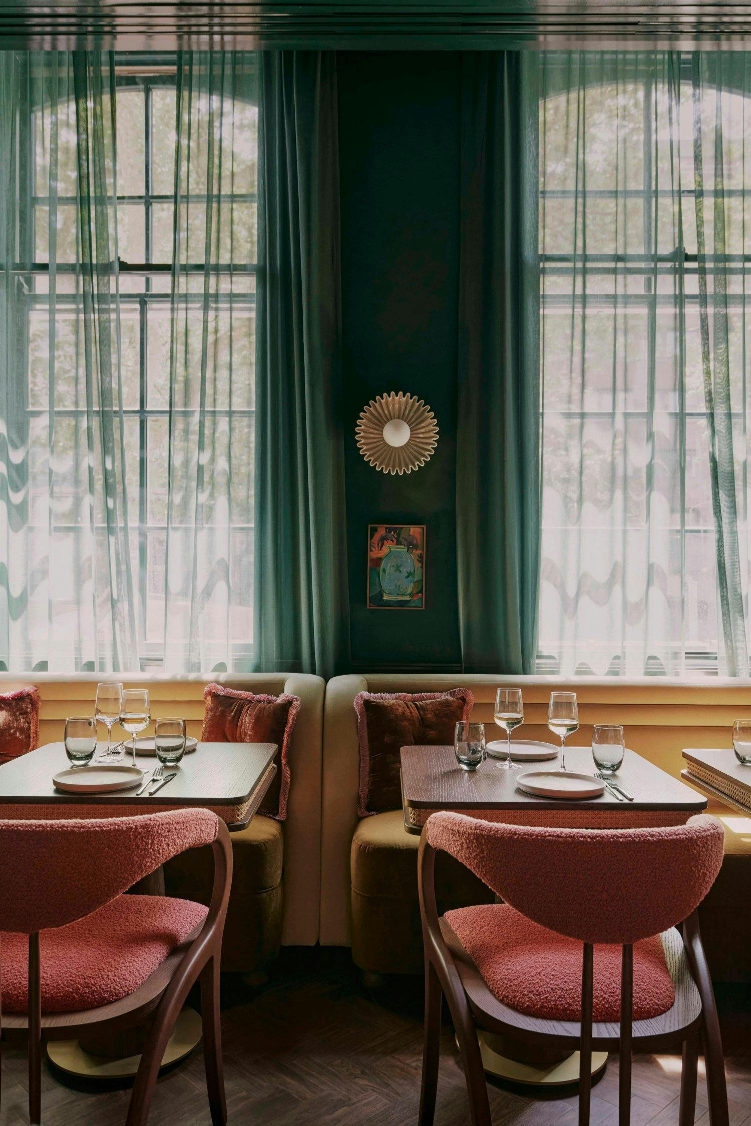 Elegant dining space in EVE Kensington, perfect for intimate meetings and small events.