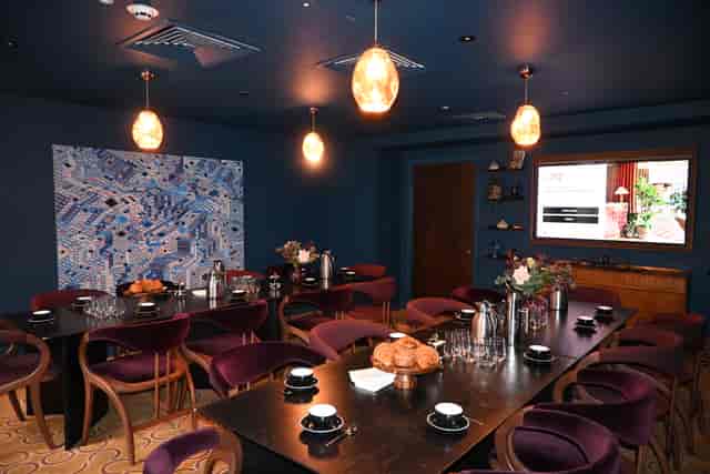 EVE Kensington private dining room with velvet seating for executive meetings and workshops.
