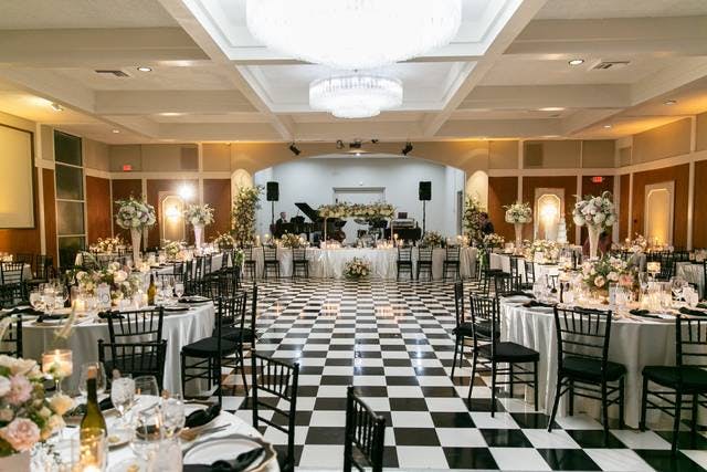 Long Beach Petroleum Club event space with elegant checkered floor, ideal for weddings.