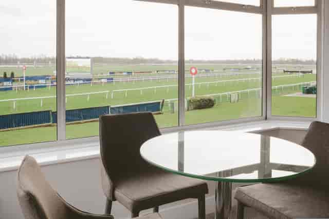 Royal Box at Kempton Park Racecourse, modern space for corporate events and gatherings.
