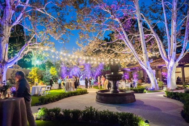 Garland Ballroom outdoor event space with string lights, ideal for weddings and corporate events.