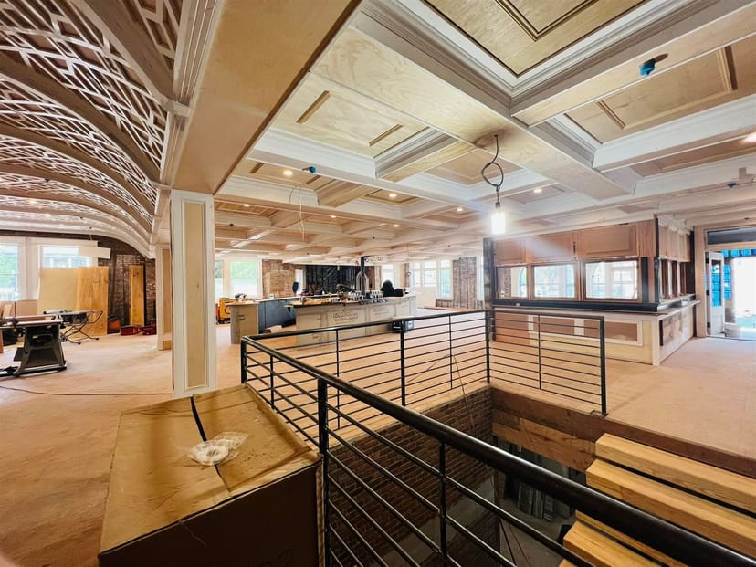 Private dining room with high ceilings, ideal for events and gatherings at Village Hall Tavern.