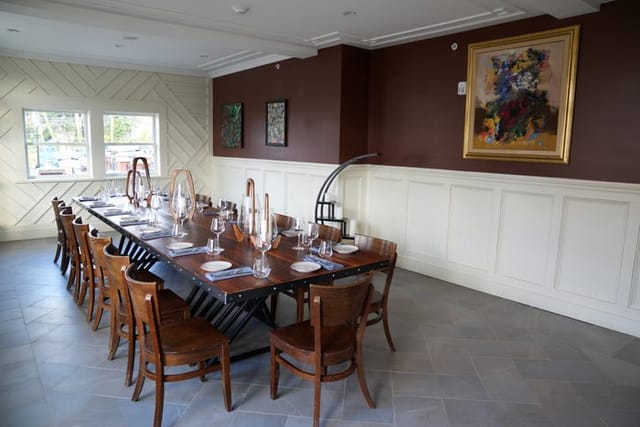 Private dining room at Village Hall Tavern with elegant table, ideal for gatherings and meetings.