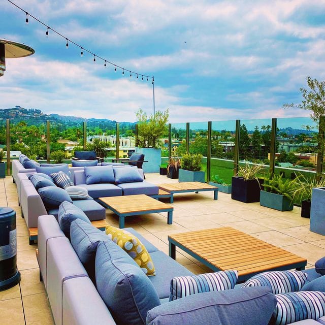 Stylish MYA Rooftop lounge at The Glenmark, ideal for networking events and gatherings.