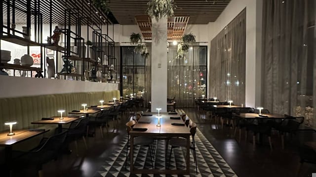Olia Restaurant at The Glenmark: modern venue with warm lighting for events and dining.