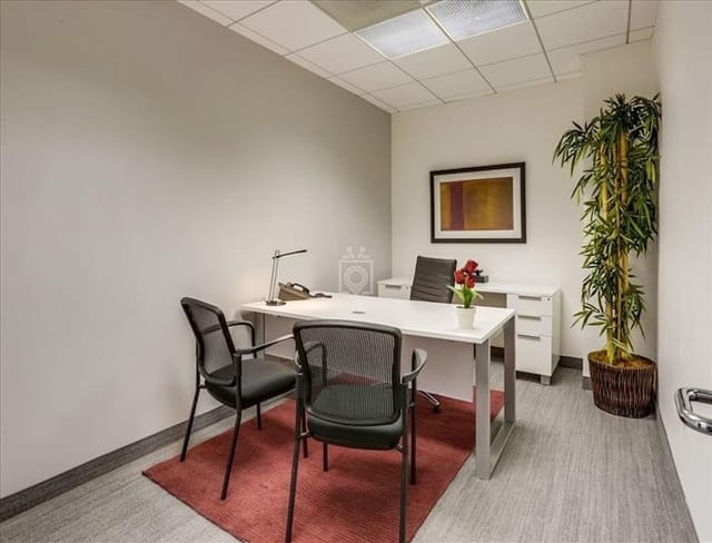 Meeting room in Barrister Suites Burbank, featuring minimalist decor for team meetings.
