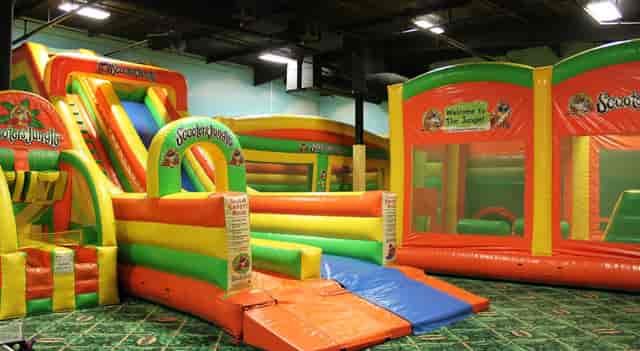 Toddler Time at Scooter's Jungle: colorful inflatable play area for birthday parties.