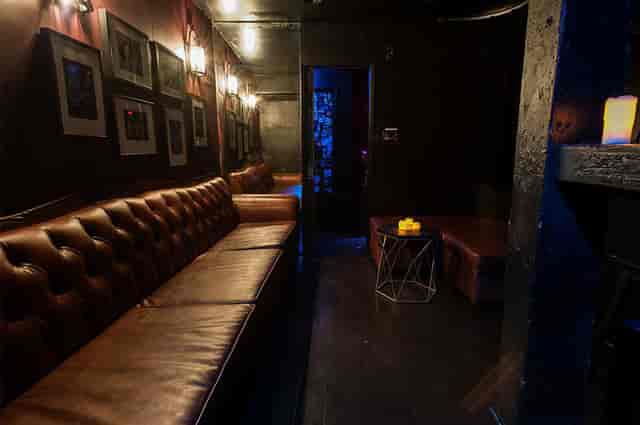 Outboard FX lounge at The Viper Room, cozy leather seating for upscale networking events.
