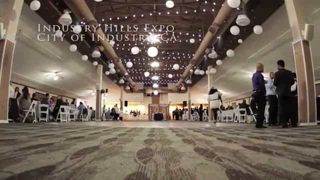 Spacious banquet hall with elegant lighting for expos and large gatherings.