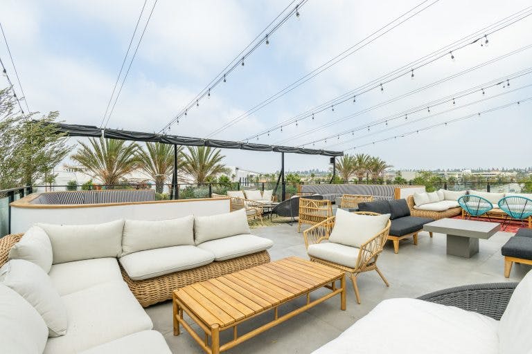 Stylish rooftop lounge at Cork & Batter, perfect for casual meetings and networking events.