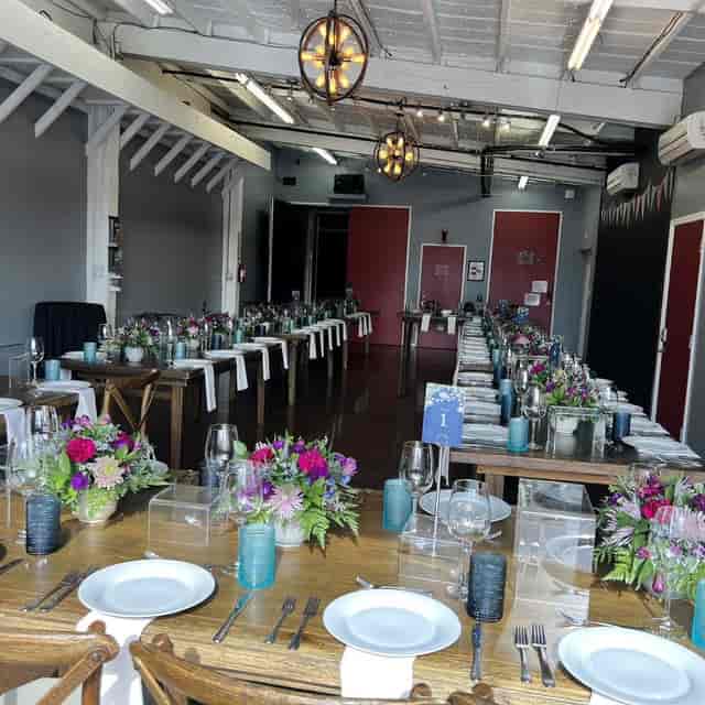 Elegant private dining room with floral centerpieces for networking events in Cork & Batter.