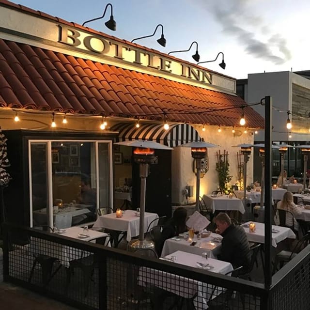 Charming outdoor patio at The Bottle Inn Hermosa, perfect for intimate gatherings and events.