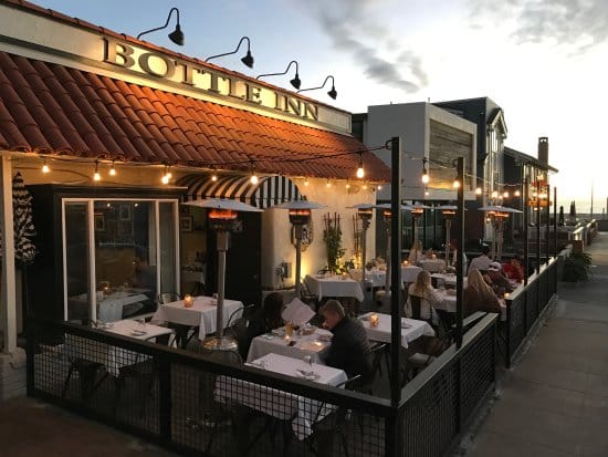 Outdoor patio dining at The Bottle Inn Hermosa, perfect for gatherings and events.
