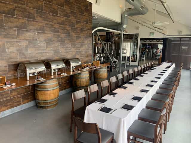 Elegant dining setup at Ballast Point Brewing for corporate events and private gatherings.
