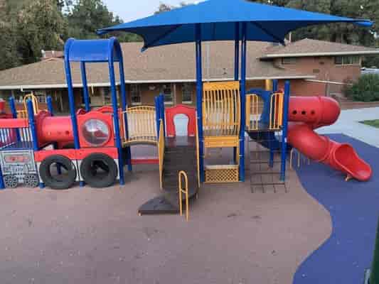 Vibrant playground at Robert R. Ovrom Park, perfect for family events and gatherings.