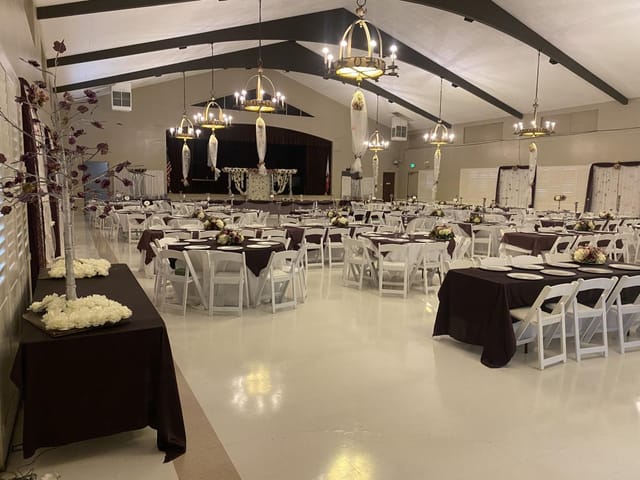 Griffith Park Visitor Center Auditorium with elegant tables, ideal for weddings and corporate events.