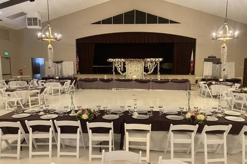 Griffith Park Visitor Center Auditorium with elegant table settings for weddings and corporate events.