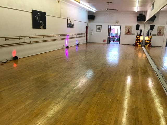 Spacious Hollywood dance studio with polished floor, ideal for events and workshops.