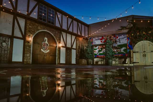 Charming outdoor venue with rustic architecture, ideal for events and celebrations.